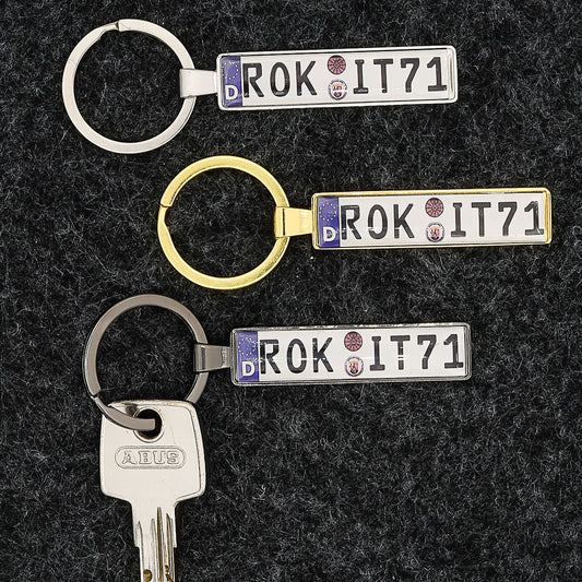 Nøglehåndtag til bilens nummerplade farvet